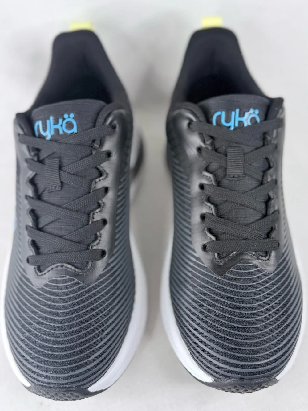 Ryka Genuine Walking Black Athletic Shoes with Blue Logo and Yellow Pull Tab